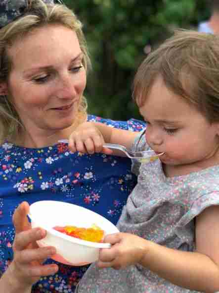 Mum and daughter eating jelly